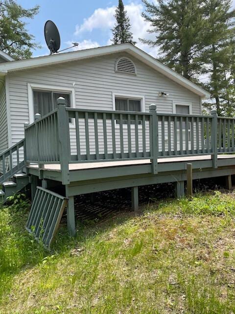 22551 Theiner Trl, Hillman, MI 49746 - rear view of house featuring a wooden deck