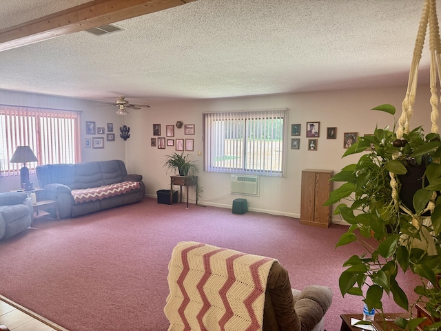 36 S Mcmasters Bridge Rd, Grayling, MI 49738 - living area featuring carpet, a textured ceiling, a wall unit AC, and a ceiling fan
