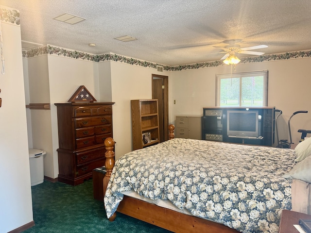 36 S Mcmasters Bridge Rd, Grayling, MI 49738 - bedroom featuring carpet, a textured ceiling, and ceiling fan