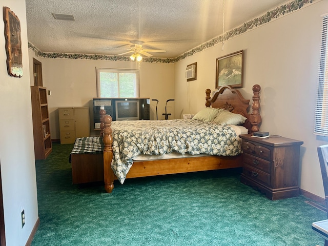 36 S Mcmasters Bridge Rd, Grayling, MI 49738 - bedroom featuring carpet flooring, a textured ceiling, and ceiling fan