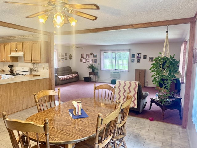 36 S Mcmasters Bridge Rd, Grayling, MI 49738 - dining room featuring a ceiling fan, light tile patterned flooring, beam ceiling, and a textured ceiling