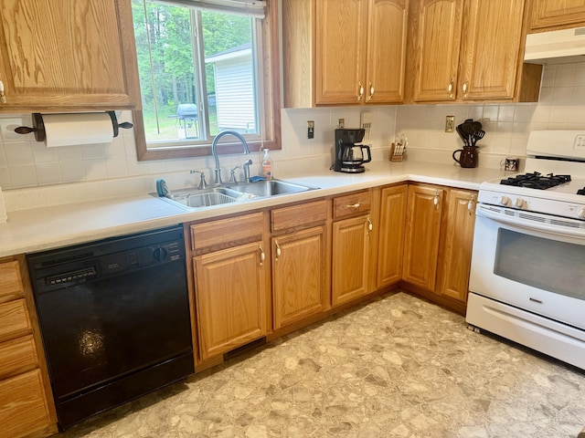 36 S Mcmasters Bridge Rd, Grayling, MI 49738 - kitchen featuring dishwasher, white gas range oven, under cabinet range hood, and tasteful backsplash