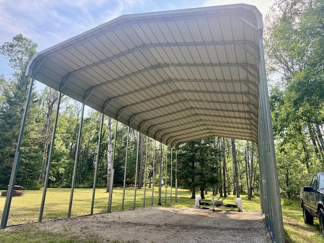 36 S Mcmasters Bridge Rd, Grayling, MI 49738 - view of home's community featuring a carport and a yard