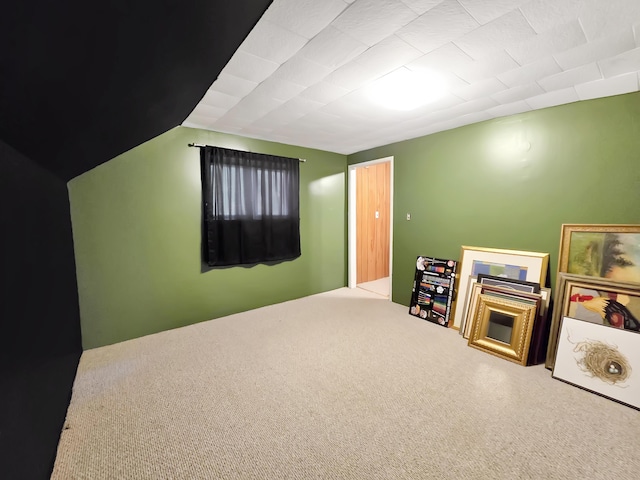 7931 Mill St, Vanderbilt, MI 49795 - game room with carpet floors and vaulted ceiling