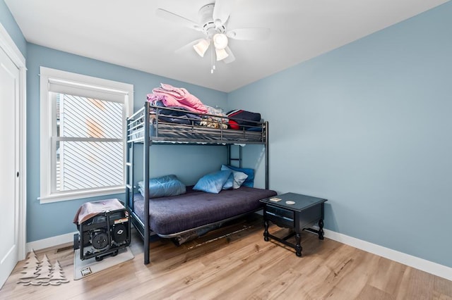 4620 Pinewood Dr, Lewiston, MI 49756 - bedroom with wood finished floors and a ceiling fan