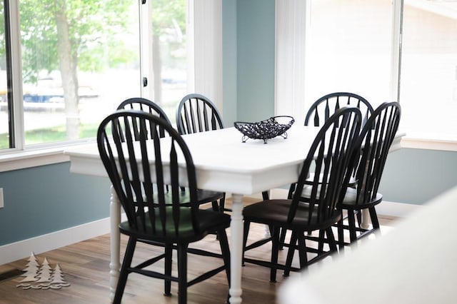 4620 Pinewood Dr, Lewiston, MI 49756 - dining space with wood finished floors and baseboards