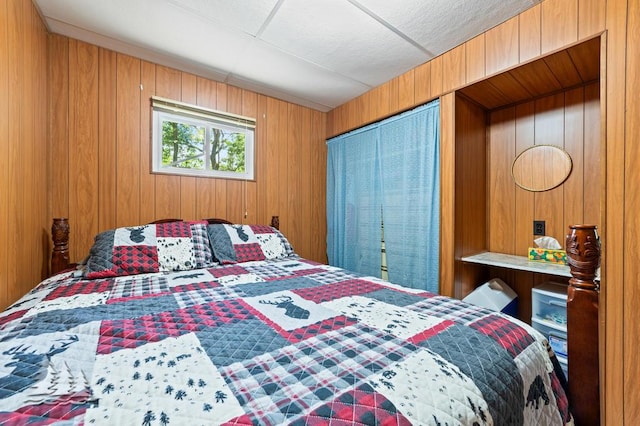 2911 Birch St, Lewiston, MI 49756 - bedroom with wood walls