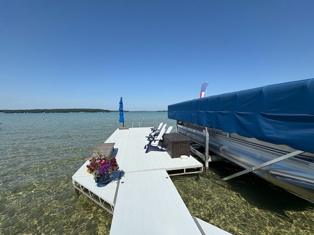 169 Pine Bluffs Rd, Roscommon, MI 48653 - dock featuring a water view