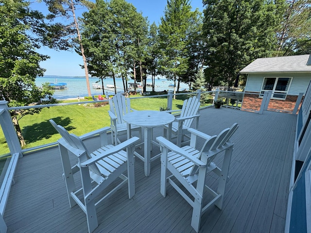 169 Pine Bluffs Rd, Roscommon, MI 48653 - wooden deck featuring a water view and a lawn