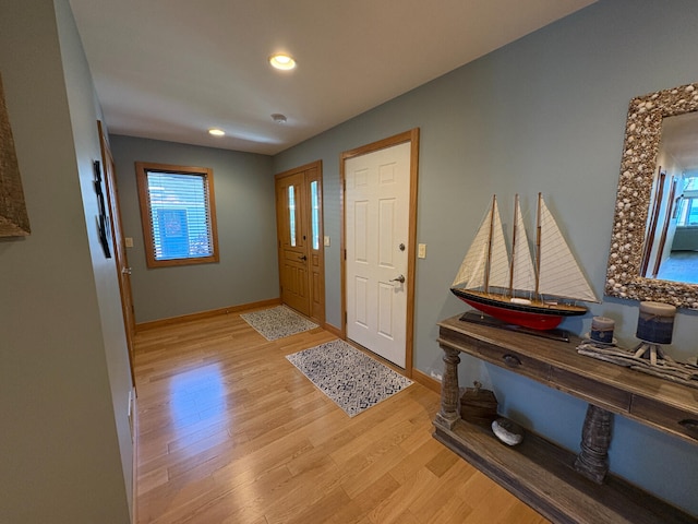 169 Pine Bluffs Rd, Roscommon, MI 48653 - entryway with light wood-style floors and recessed lighting