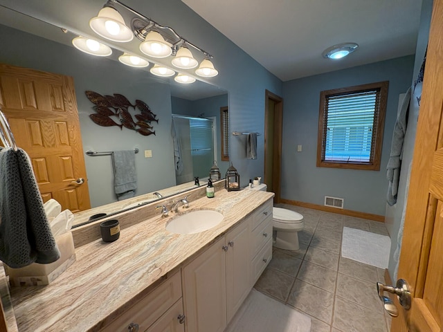 169 Pine Bluffs Rd, Roscommon, MI 48653 - bathroom with a shower stall, vanity, and tile patterned flooring