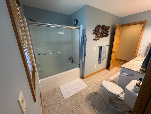 169 Pine Bluffs Rd, Roscommon, MI 48653 - full bathroom featuring combined bath / shower with glass door, vanity, and tile patterned flooring