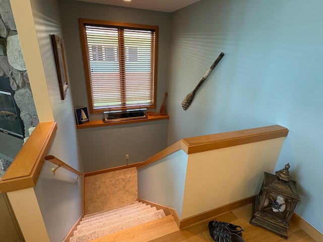 169 Pine Bluffs Rd, Roscommon, MI 48653 - staircase with baseboards