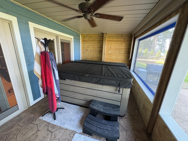 169 Pine Bluffs Rd, Roscommon, MI 48653 - sunroom / solarium featuring a hot tub