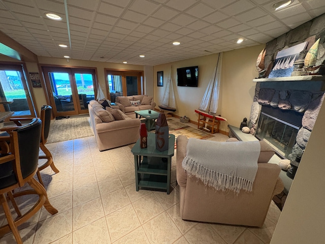 169 Pine Bluffs Rd, Roscommon, MI 48653 - living area featuring a stone fireplace and recessed lighting