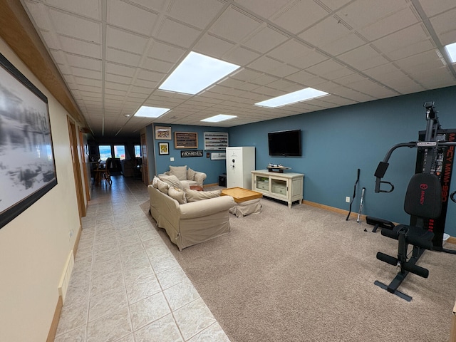 169 Pine Bluffs Rd, Roscommon, MI 48653 - tiled living area with a paneled ceiling