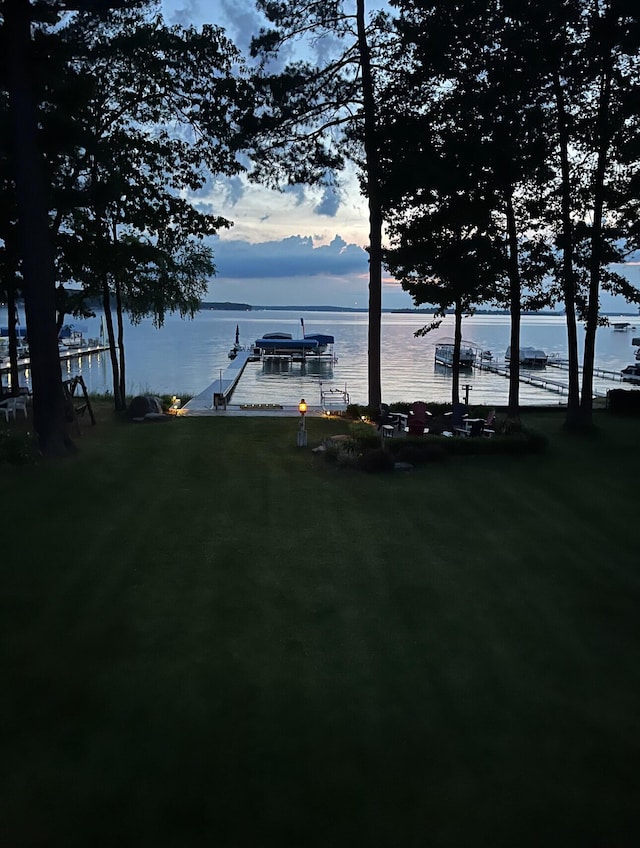 169 Pine Bluffs Rd, Roscommon, MI 48653 - dock area featuring a water view