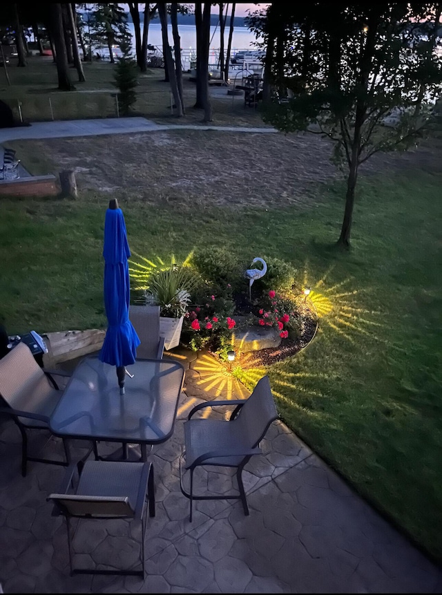 169 Pine Bluffs Rd, Roscommon, MI 48653 - view of patio with outdoor dining area