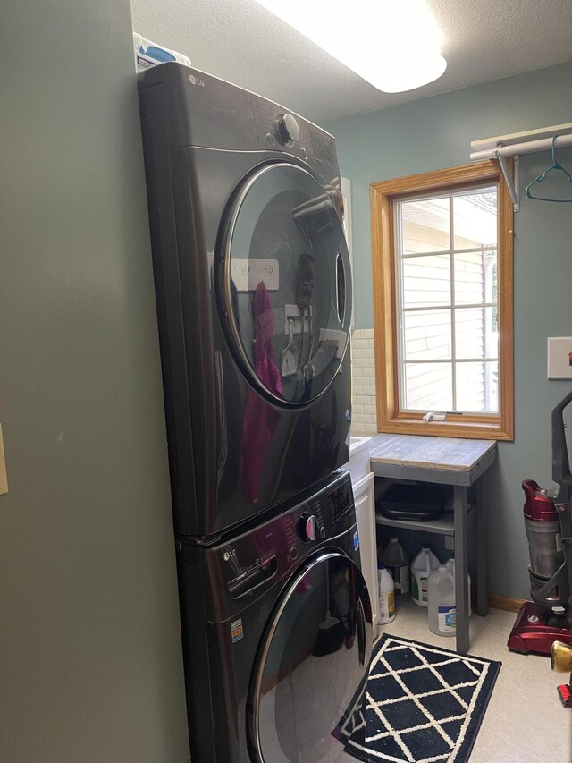 12395 Atkinson Rd, Lachine, MI 49753 - laundry area with estacked washer and dryer