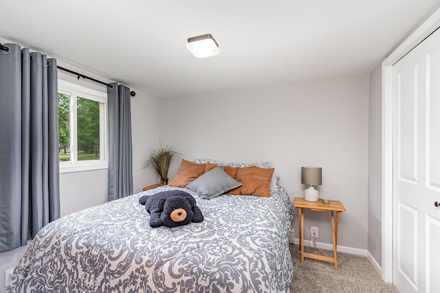 319 Old Trl, Houghton Lake, MI 48629 - carpeted bedroom with baseboards
