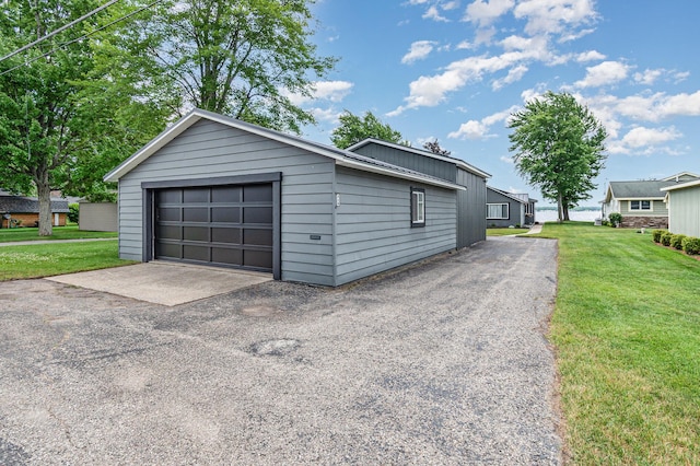 319 Old Trl, Houghton Lake, MI 48629 - garage with driveway