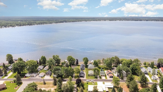 319 Old Trl, Houghton Lake, MI 48629 - aerial perspective of suburban area with a nearby body of water