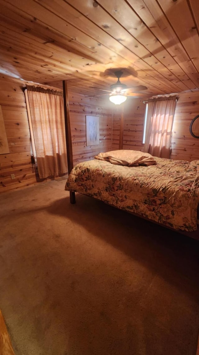1025 Lake Side Trl, Barton City, MI 48705 - carpeted bedroom with wood walls and wooden ceiling