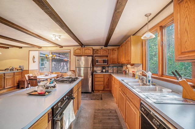 5699 N Red Oak Rd, Lewiston, MI 49756 - kitchen featuring stainless steel appliances, light countertops, pendant lighting, beamed ceiling, and a chandelier