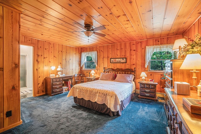 5699 N Red Oak Rd, Lewiston, MI 49756 - bedroom featuring wood ceiling, dark carpet, and wood walls