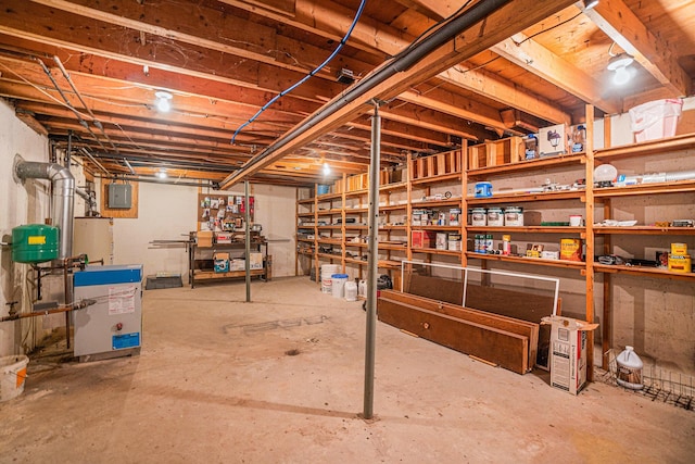 5699 N Red Oak Rd, Lewiston, MI 49756 - unfinished below grade area featuring water heater