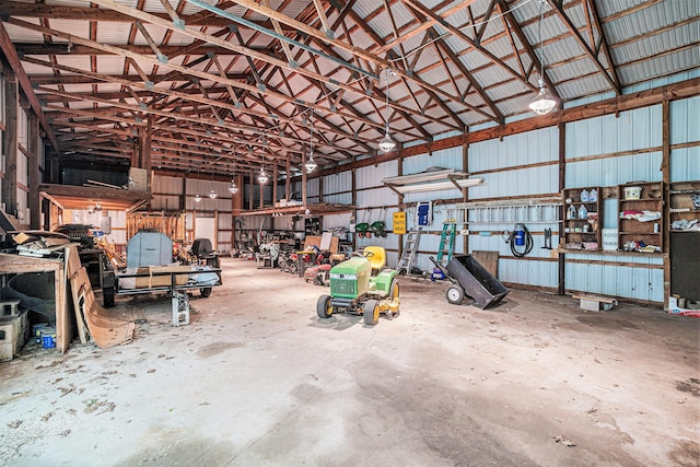 5699 N Red Oak Rd, Lewiston, MI 49756 - garage featuring metal wall