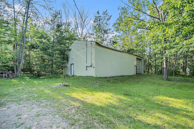 5699 N Red Oak Rd, Lewiston, MI 49756 - view of pole building featuring a yard
