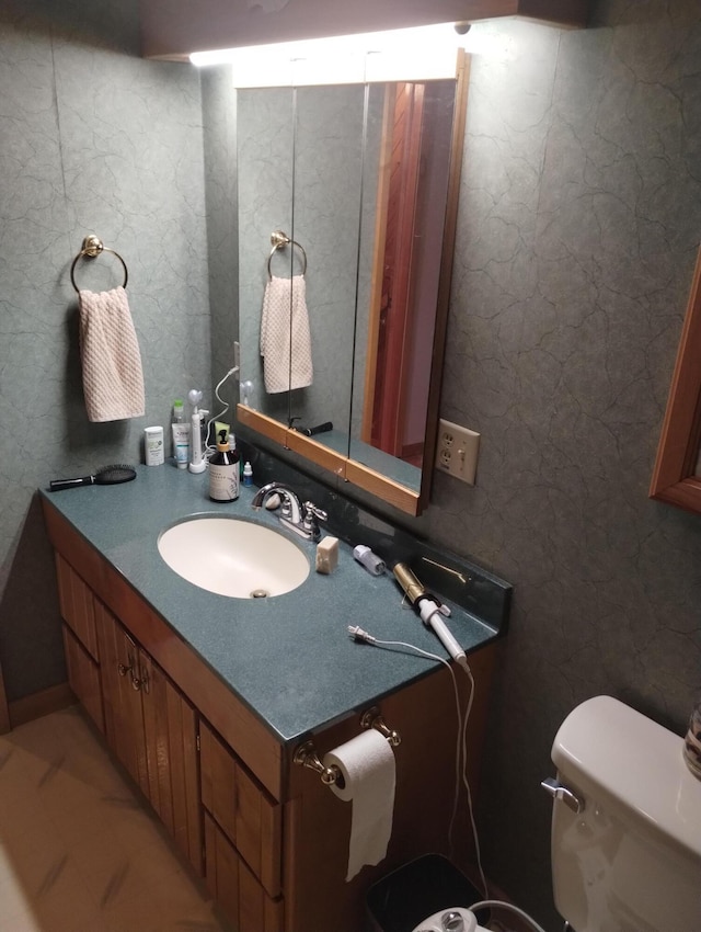 19241 Pine Tree Ct, Hillman, MI 49746 - half bathroom with vanity and toilet
