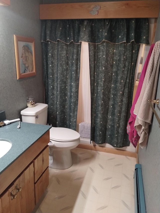 19241 Pine Tree Ct, Hillman, MI 49746 - full bath featuring vanity, a baseboard heating unit, tile patterned floors, and a shower with shower curtain
