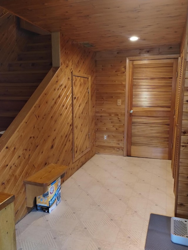 19241 Pine Tree Ct, Hillman, MI 49746 - additional living space featuring wood walls, light flooring, wooden ceiling, and recessed lighting