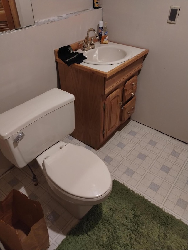 19241 Pine Tree Ct, Hillman, MI 49746 - half bathroom with toilet and vanity