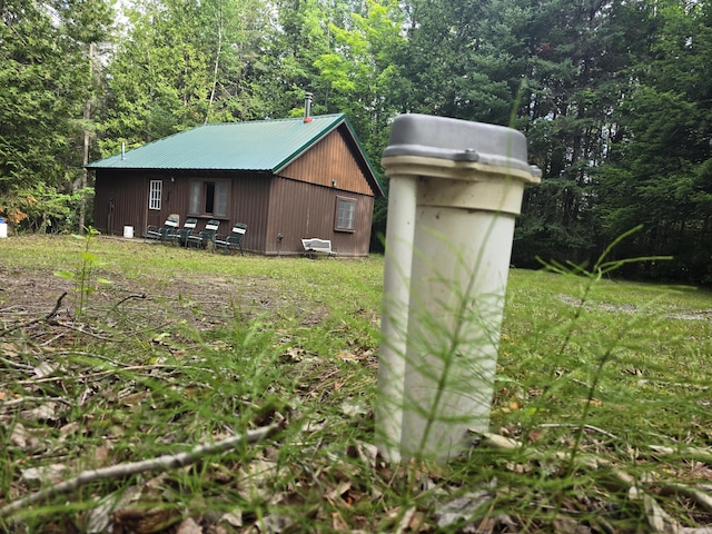 1987 N Galbraith Rd, Mio, MI 48647 - view of outdoor structure featuring a forest view