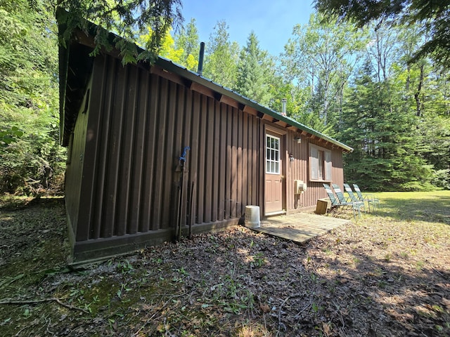 1987 N Galbraith Rd, Mio, MI 48647 - view of side of home featuring board and batten siding