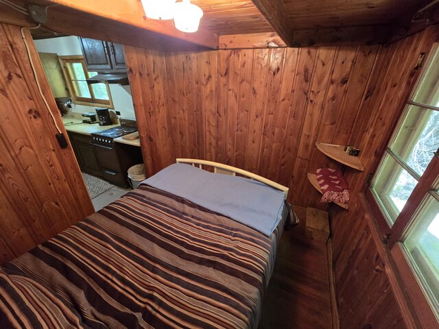1987 N Galbraith Rd, Mio, MI 48647 - bedroom with wooden walls and wooden ceiling