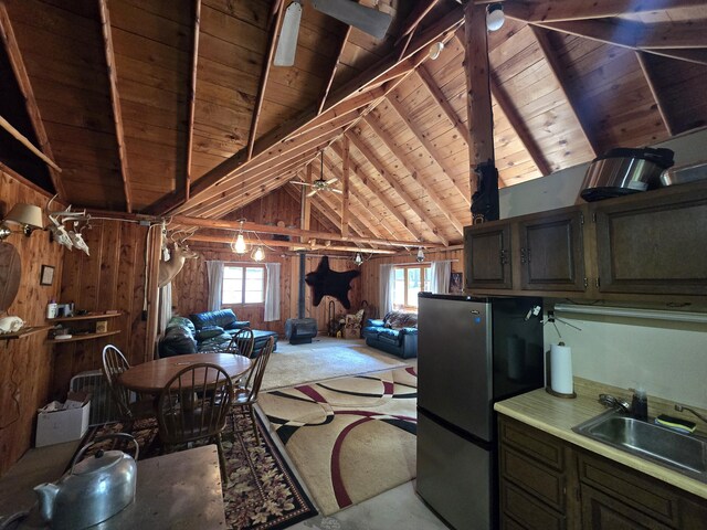 1987 N Galbraith Rd, Mio, MI 48647 - miscellaneous room with wood ceiling, wooden walls, and ceiling fan