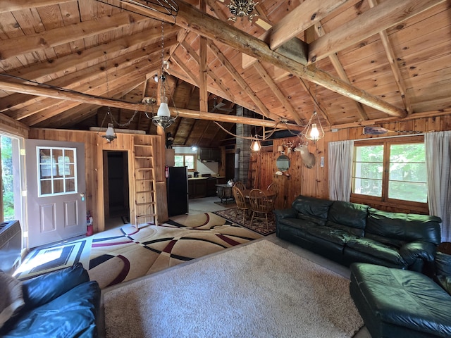 1987 N Galbraith Rd, Mio, MI 48647 - living room with wooden ceiling, wooden walls, and plenty of natural light