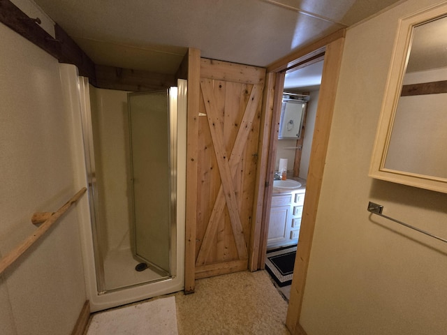 1987 N Galbraith Rd, Mio, MI 48647 - bathroom with a shower stall and a sink