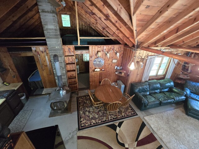 1987 N Galbraith Rd, Mio, MI 48647 - living room featuring healthy amount of natural light, wood walls, and wood ceiling