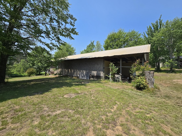 8361 Brookfield Dr, Elmira, MI 49730 - view of grassy yard featuring a pole building and an outdoor structure