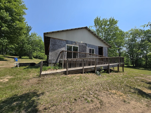 8361 Brookfield Dr, Elmira, MI 49730 - view of front of property featuring a deck and a front yard