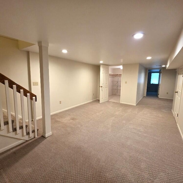 176 Long Rapids Rd, Alpena, MI 49707 - finished below grade area featuring light carpet and recessed lighting