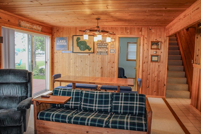 11920 W Shore Dr, Houghton Lake, MI 48629 - living room featuring wood ceiling, stairway, and wooden walls