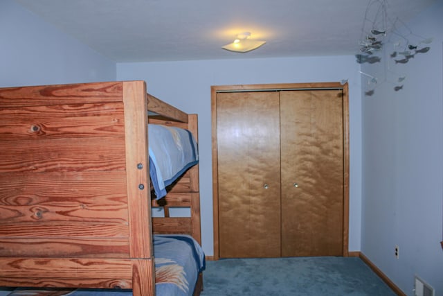 11920 W Shore Dr, Houghton Lake, MI 48629 - carpeted bedroom with a closet and baseboards