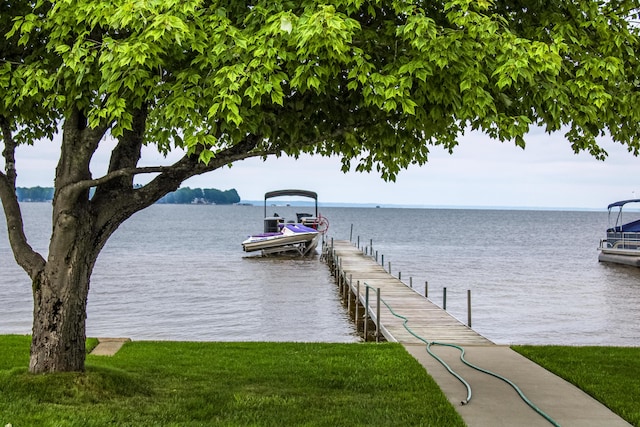 11920 W Shore Dr, Houghton Lake, MI 48629 - dock area featuring a water view and boat lift