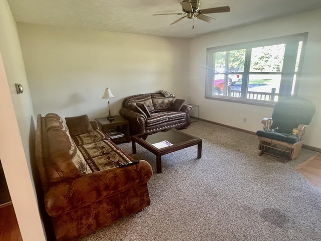 7125 S Military Rd, Grayling, MI 49738 - living room with a ceiling fan and carpet floors